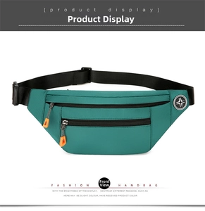 Front detail of large capacity oxford waist bag in teal with orange zipper pulls