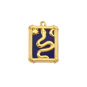 Detailed shot of a gold-tone pendant with a blue enamel snake and celestial moon motif