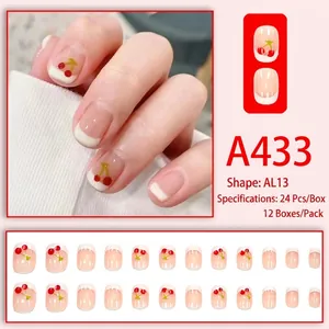 Faux ongles courts French au motif cerise sur base rose translucide modèle AL13