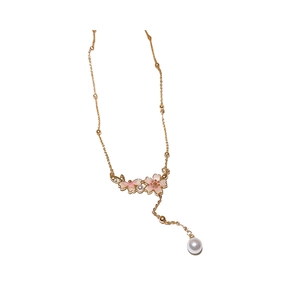 Elegant gold cherry blossom necklace with pink enamel flower and pearl pendant