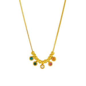 Gold box chain necklace with five colorful zircons and golden beads on white background