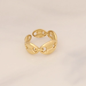 Detail of gold geometric stainless steel ring featuring a stylish chain link design