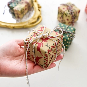 Mini Christmas gift boxes with reindeer and polka dot patterns for holiday tree decoration