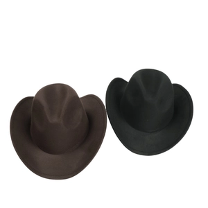 Detail view of classic wide brim felt cowboy hats in dark brown and black colors