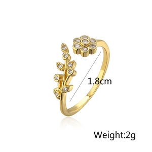 Detailed view of gold plated flower ring showing 1.8cm diameter and 2g weight
