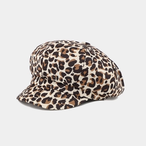 Detail view of stylish leopard print newsboy cap with classic retro octagon crown design