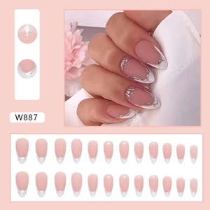 Almond shaped press-on nails with nude pink base and silver metallic French trim, model W887