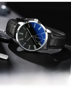 Detailed close-up of a blue sunray dial watch with Roman numerals and leather strap