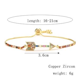 Adjustable gold arrow bracelet with colorful pavé cubic zirconia and slide buckle