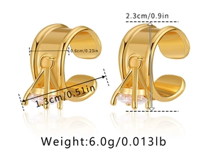 Detailed view of gold C-shaped ear cuff with inlaid zircons including product dimensions
