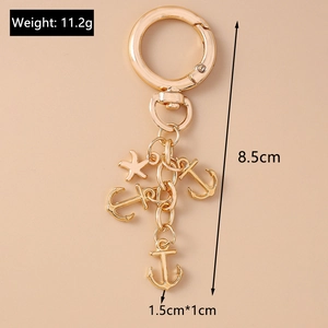 Golden starfish and anchor keychain with dimensions of 8.5cm length and 11.2g weight