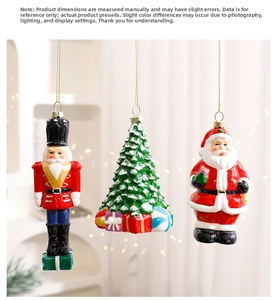 Detailed view of hand-painted ceramic Nutcracker, Santa and Xmas tree ornaments