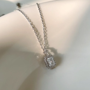 Elegant S925 sterling silver necklace with emerald cut zircon halo pendant for women