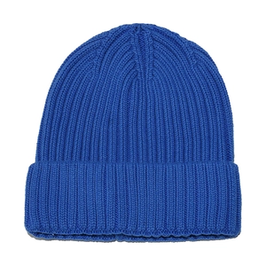 Close-up of royal blue ribbed knit beanie featuring thick vertical texture and folded cuff