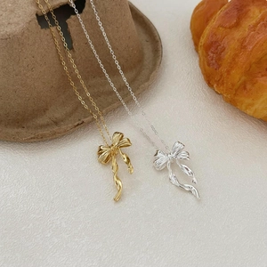 Minimalist 925 silver bow pendant necklace in gold and silver finish for women