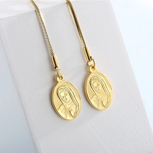 Gold titanium steel pendant necklace featuring a religious relief and sleek snake chain