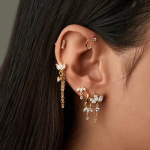 Gold marquise zircon hoop earrings set shown on model in a layered bohemian style