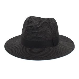 Classic black straw Panama fedora hat with elegant grosgrain band and wide brim for sun protection