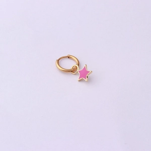 Detail of a gold hoop earring featuring a pink enamel star charm on a purple background
