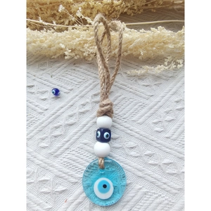 Handmade woven hemp rope Turkish evil eye wall hanging with blue glass bead decor
