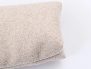 Close-up detail of premium cashmere fleece texture on casual stand collar jacket