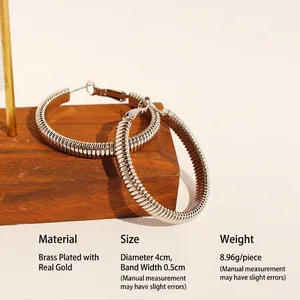 Fashion spring threaded large hoop earrings in silver-tone brass for a stylish look