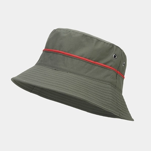 Detail of army green bucket hat showing red stripe and metal ventilation eyelets