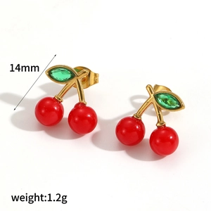 Detail of red cherry earrings with green crystal leaf and 14mm size measurement