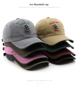 Detailed view of vintage washed cotton baseball caps set with premium letter embroidery