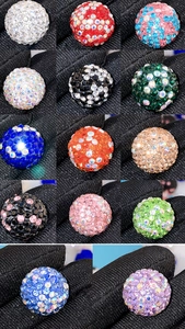 Macro view of assorted colorful rhinestone paved clay beads for DIY jewelry and phone charms