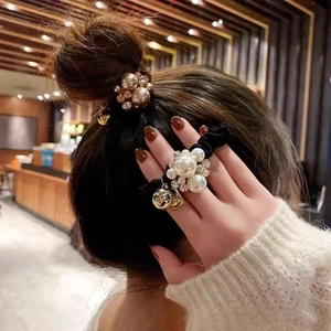 Elegant velvet hair ring with white pearls and crystals for bun hairstyles and ponytails