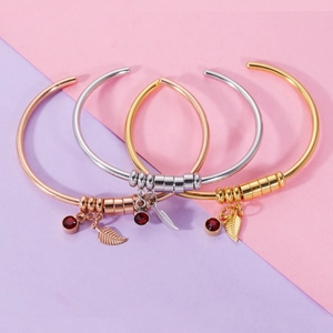 Minimalist stainless steel cuff bracelets with birthstones and leaf charms in three colors