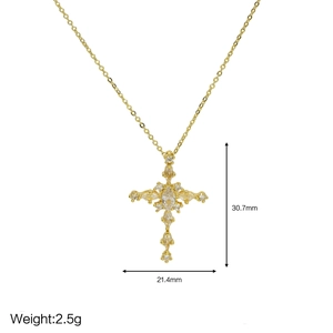 Detailed view of 18k brass gold cross pendant with cubic zirconia and size measurements