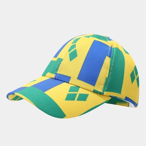 Close-up of kids baseball cap showing yellow, green, and blue geometric panel details