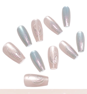 Detail of aurora blue and pink glitter press-on nails with mermaid tail shimmer effect