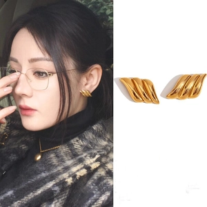 18K gold plated stainless steel wave wing earrings in a modern geometric stud design