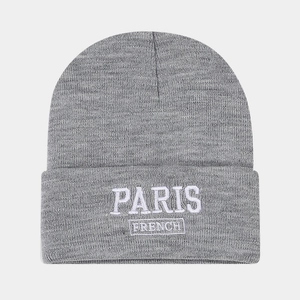 Detailed view of Paris embroidery on heather grey knitted beanie with ribbed texture