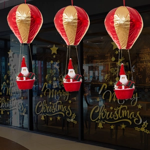 Christmas Santa Claus in red and gold hot air balloon hanging decorations for holiday party
