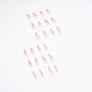 Artistic abstract face line art press-on nails in long coffin shape with nude base