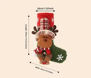 Detailed view of Christmas stocking with reindeer doll and size dimensions 44cm x 20cm