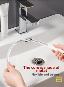 Flexible drain cleaning brush with a metal core for bending and clearing hair clogs