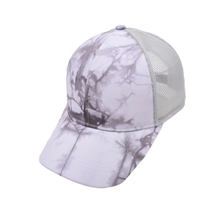 Detail of tie-dye baseball cap with breathable mesh back and adjustable grey strap