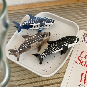 Shark whale shaped acetate hair claws in dark blue and black with marble patterns