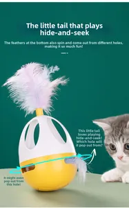 Interactive electric cat toy featuring rotating purple feathers and colorful tumbler base