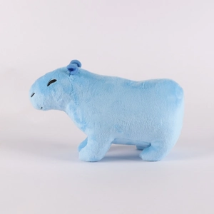 Side view of cute blue capybara plush toy with soft texture on white background