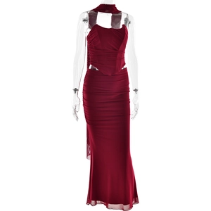 Detailed view of red halter neck dress featuring pleated texture and slim fit design