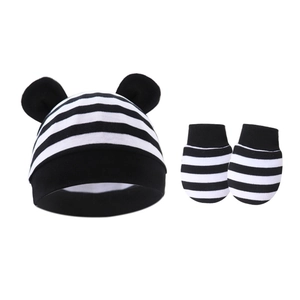 Detail of baby beanie with Mickey ears and anti-scratch mittens in black white stripes