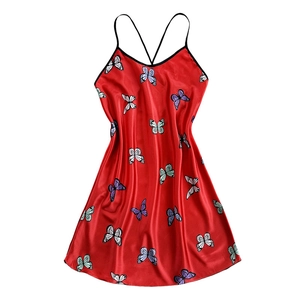 Red silk-like slip nightgown featuring a vivid butterfly print and crisscross straps
