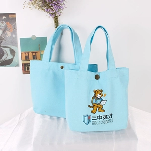 Minimalistische hellblaue Canvas-Tragetasche mit Cartoon-Tiger und Druckknopf