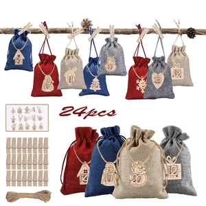 Christmas advent calendar kit with 24 linen bags, wooden clips, and hanging rope detail